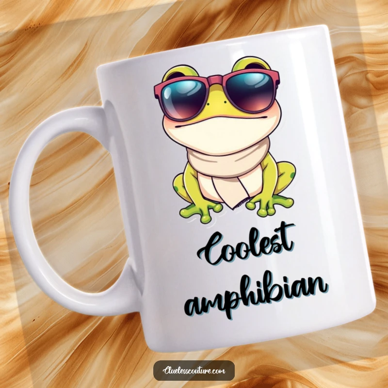 Funny mug showcasing a fashionable frog wearing oversized sunglasses and a small scarf, exuding a cool and casual demeanor.
