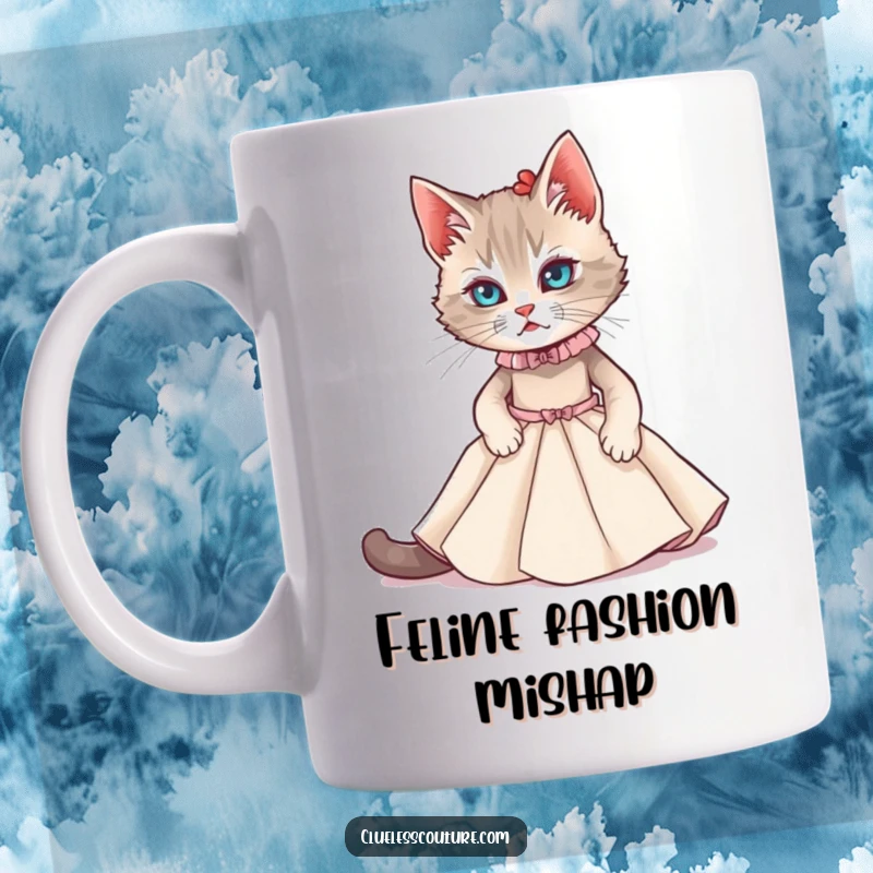 Funny mug showing a cat struggling to fit into a miniature couture gown, embodying fashion-forward feline frustration.