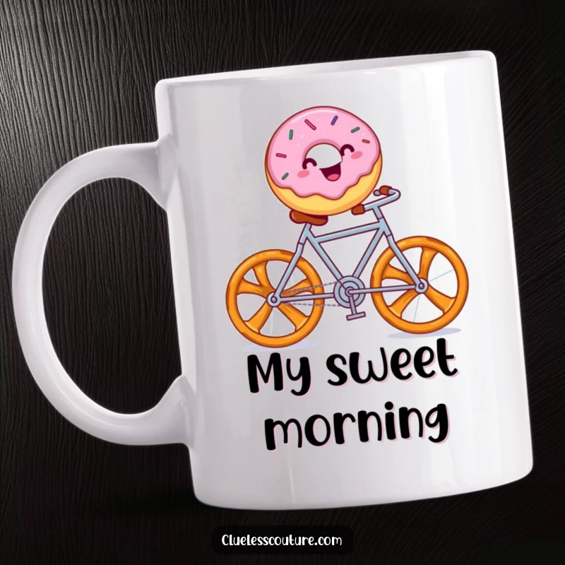 Funny mug showcasing a cheerful donut with sprinkles riding a bicycle made of pretzels, a joyful scene.