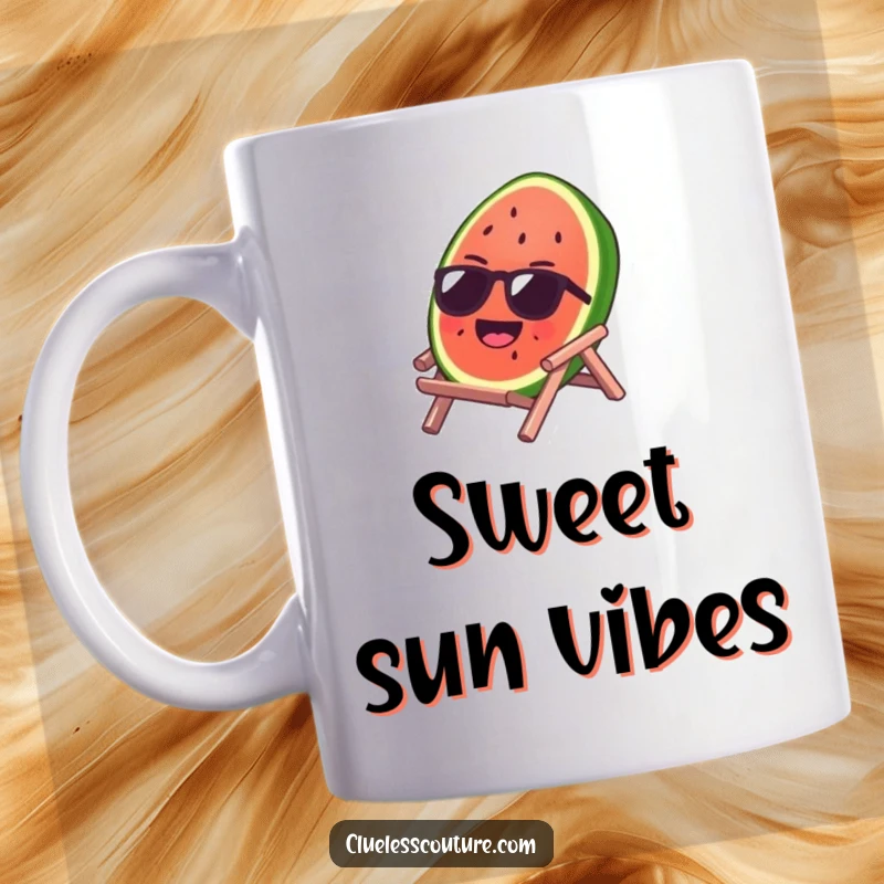 Funny mug featuring a laughing watermelon slice wearing sunglasses, relaxing on a tiny beach chair in the sun.
