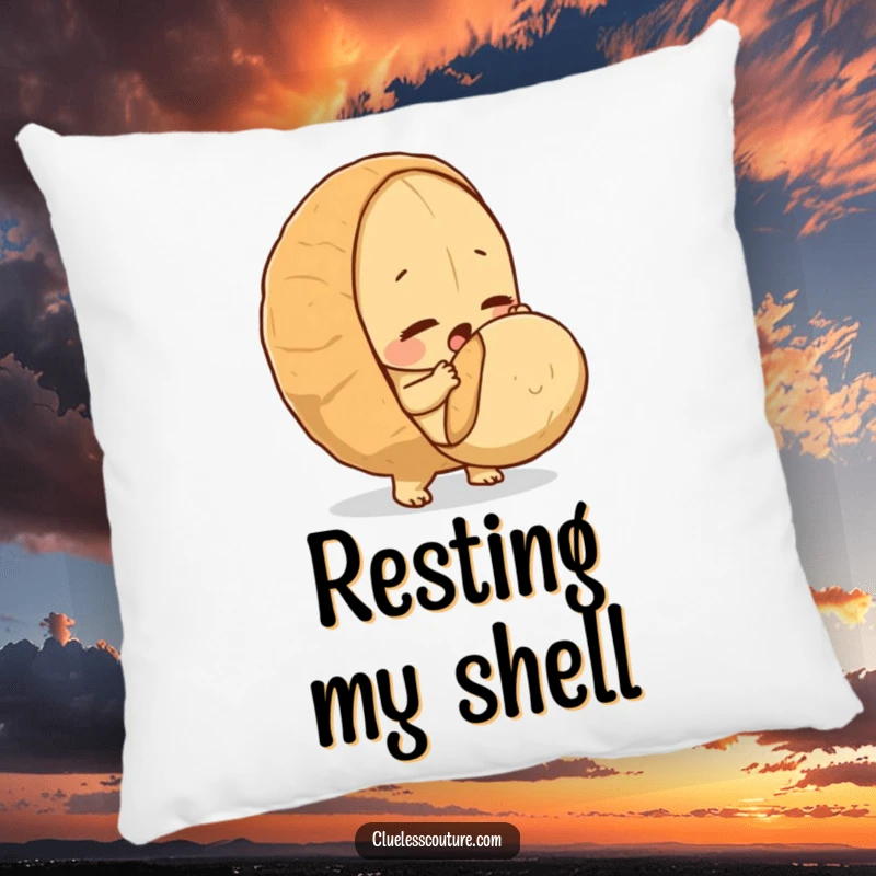 Funny pillow featuring a determined peanut heroically trying to crack a giant nut.