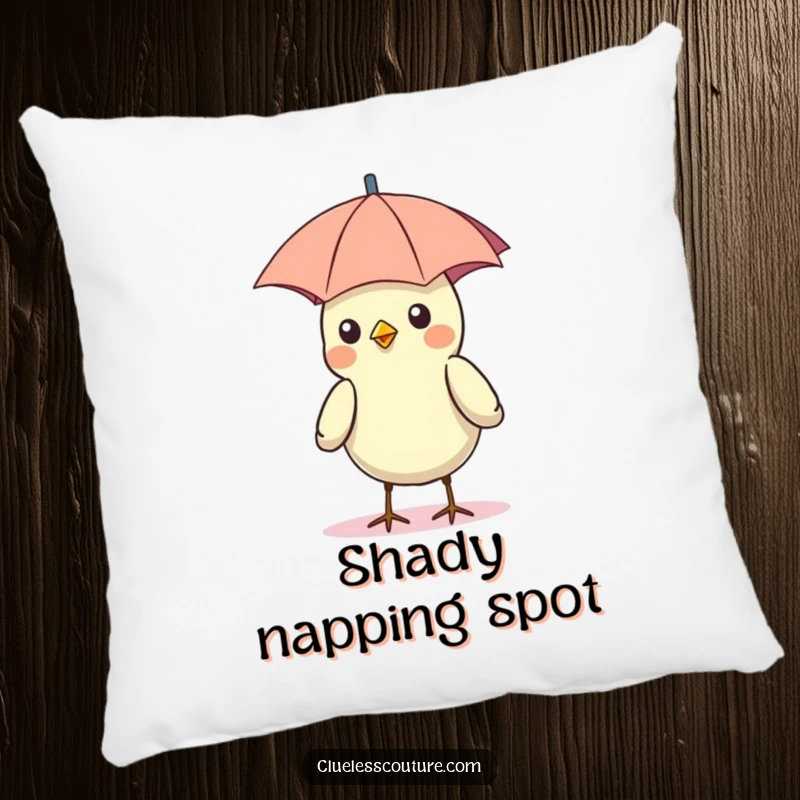Funny pillow design of a bird wearing a tiny umbrella as a hat, sitting happily in the sun.