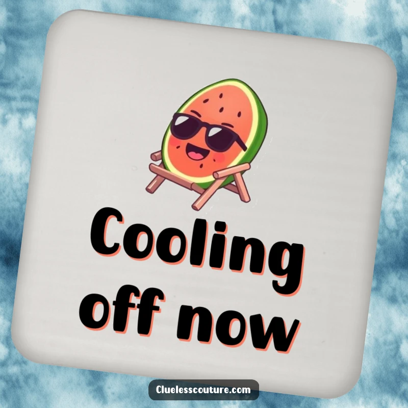 Funny drink coaster featuring a laughing watermelon slice with sunglasses on a tiny beach chair, a humorous addition to protect surfaces.