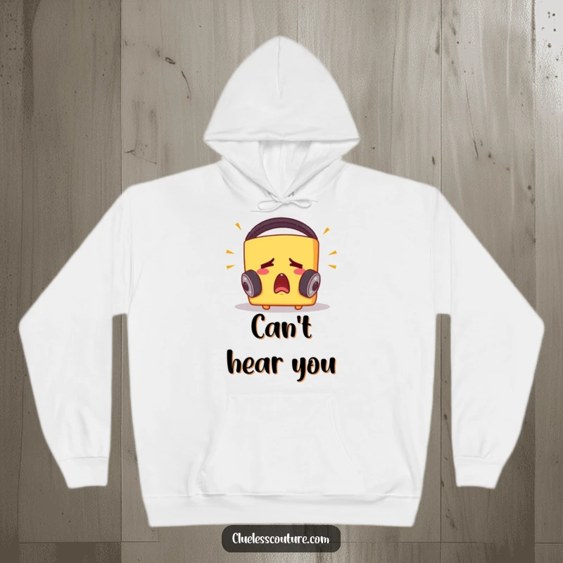 Funny hoodie illustration of a startled cheese block wearing large headphones, its expression comical as it reacts to intense loud music.
