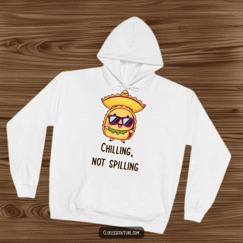 Funny hoodie featuring a proud anthropomorphic taco character wearing a miniature sombrero and cool sunglasses, embodying festive coolness.