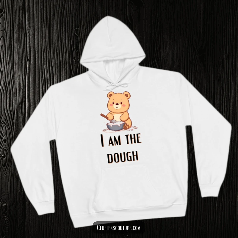 Funny hoodie with a bear comically coated in flour while baking, offering warmth and a hearty dose of kitchen humor.