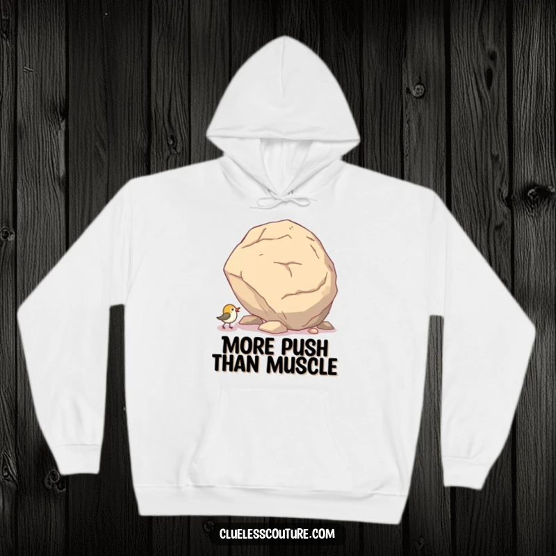 Funny hoodie featuring a small bird comically trying to move a huge boulder uphill, designed for warmth and inspiration.