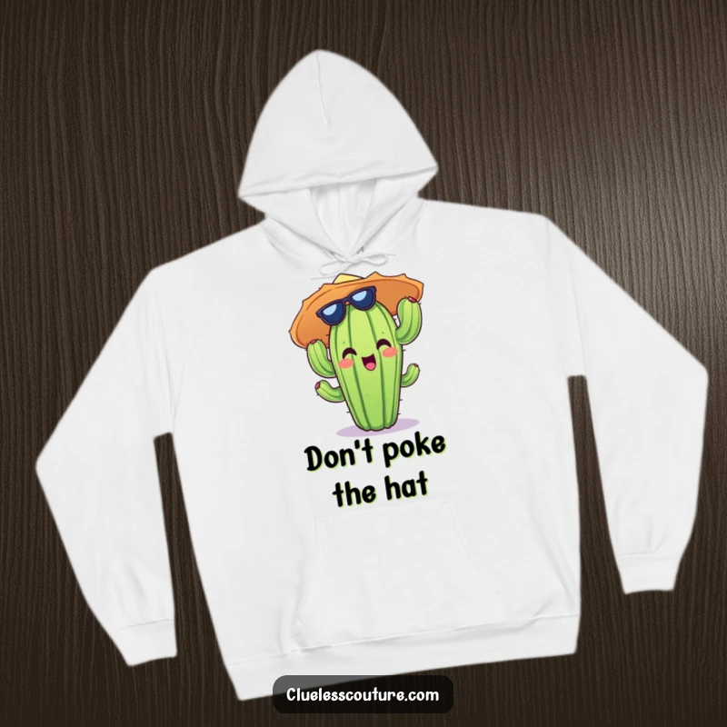 Funny hoodie showcasing a cheerful cactus character's head wearing a comically oversized, ridiculous sun hat.