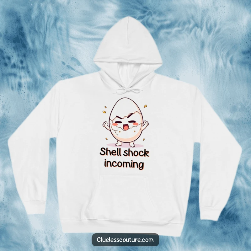 Funny hoodie showing a determined egg character struggling comically to crack itself open, perfect for breakfast lovers.