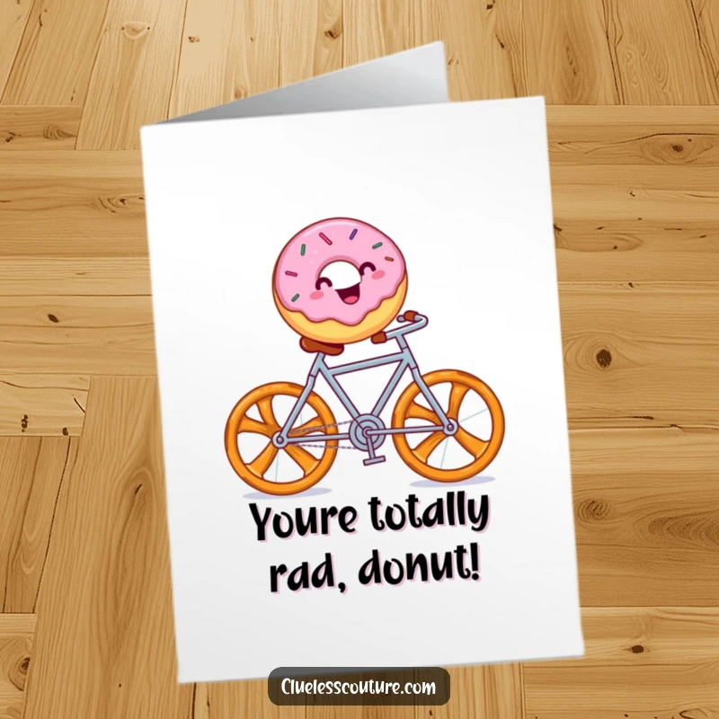 Funny Free Printable Congratulations Card: Happy donut with sprinkles rides a bicycle made of pretzels.
