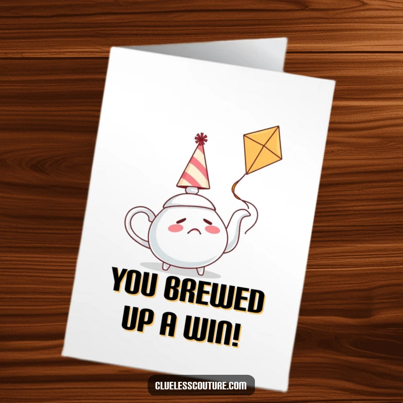 Funny free printable congratulations card showcasing a bewildered teapot attempting to fly a kite, a delightful and humorous scene.
