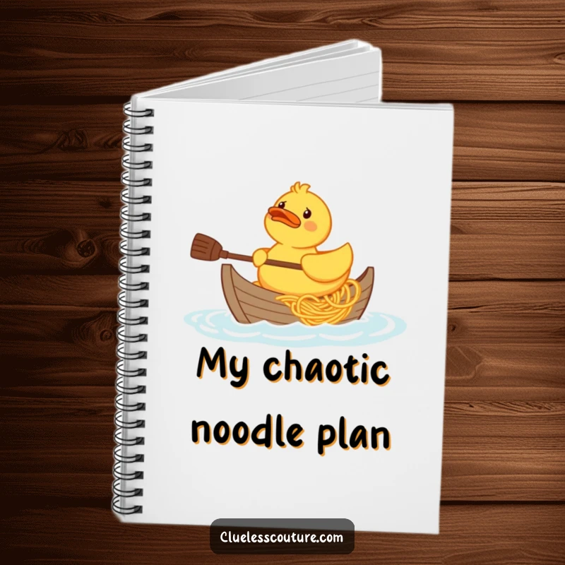 Funny confused rubber duck character trying to paddle a boat made of spaghetti, cover design on a notebook.