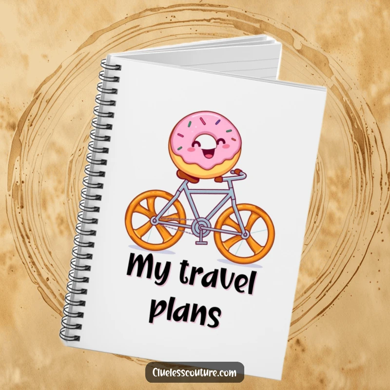 Funny notebook with a cheerful donut with sprinkles riding a pretzel bicycle, perfect for notes.