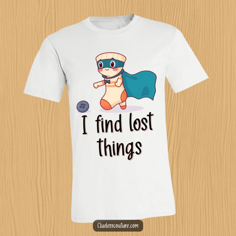Funny t-shirt of a brave sock in a superhero cape in the act of rescuing a lost button, celebrating small acts of valor.