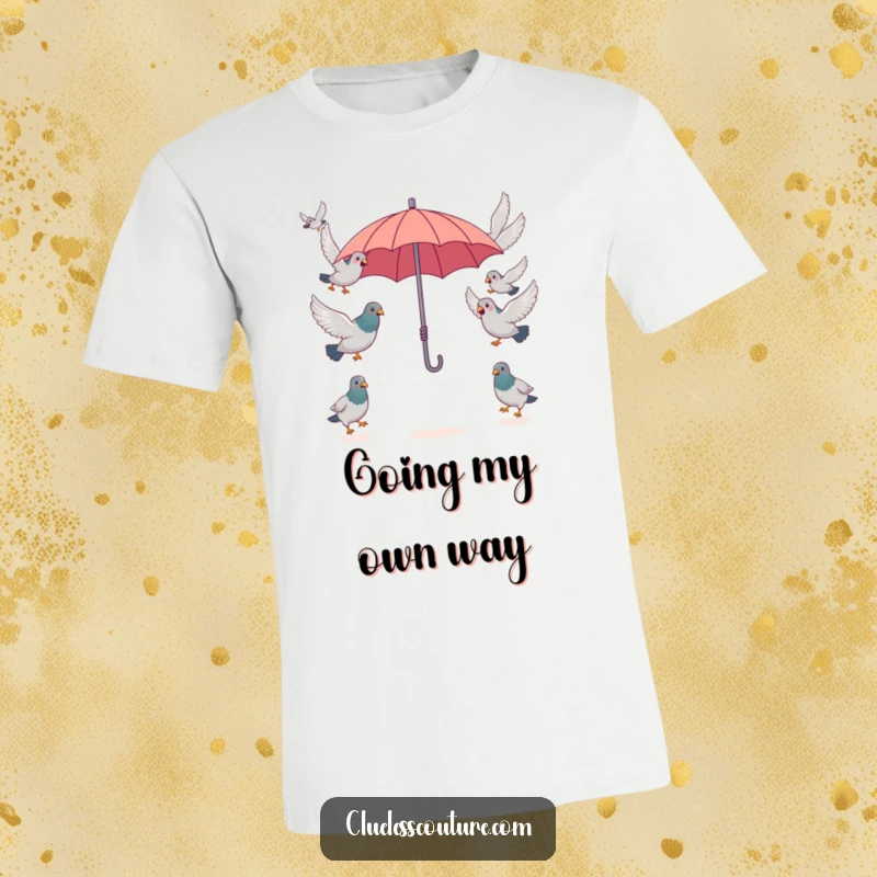 Funny surprised pigeons attempting to fly in opposite directions from a single, tiny umbrella, a humorous scene on this funny t-shirt.