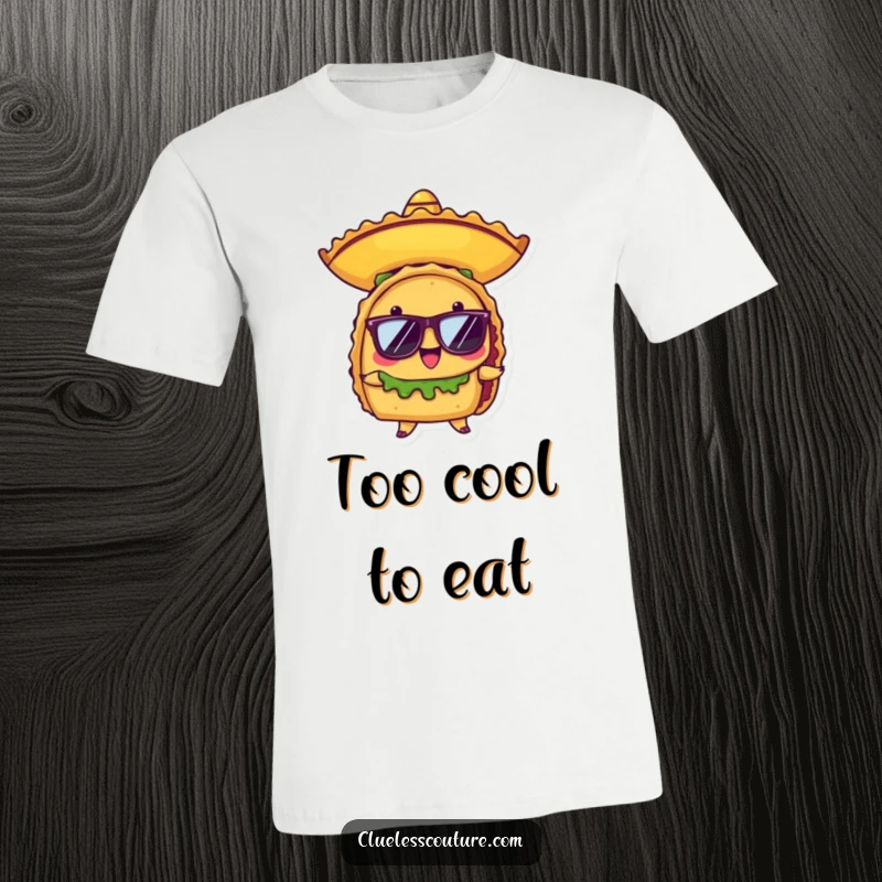 Funny t-shirt showcasing a proud anthropomorphic taco character sporting a tiny sombrero and stylish sunglasses, ready for a fiesta.