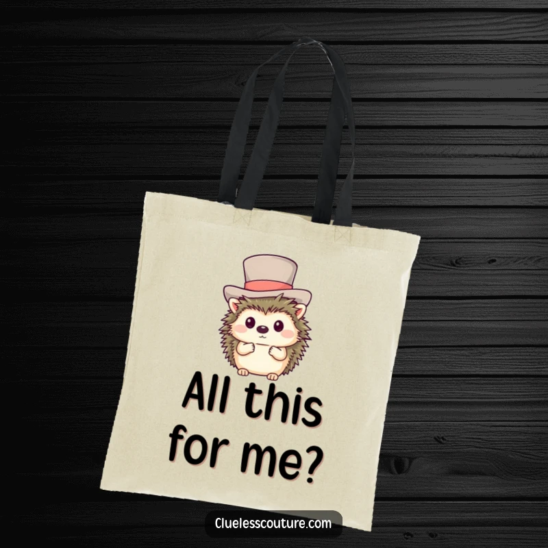 Funny tote bag illustrating a shy hedgehog hilariously trying to balance a very large top hat.