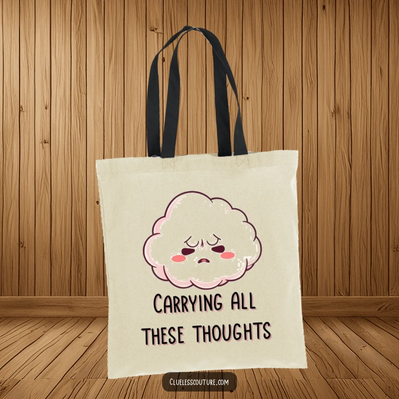 Funny tote bag with a nervous cloud character attempting to form a shape, symbolizing gentle worry, a perfect funny gift.
