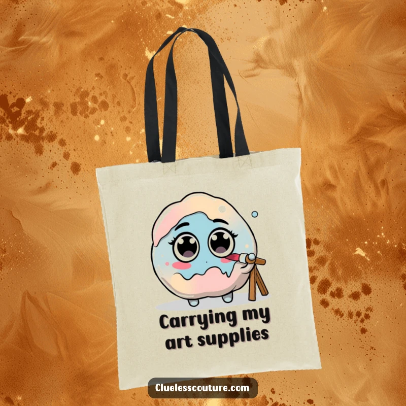 Funny tote bag showing a blob of paint with googly eyes hilariously trying to paint its own form, a humorous artistic endeavor.