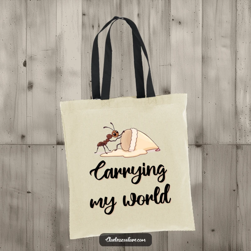 Funny tote bag featuring a tiny ant attempting to lift a colossal dropped ice cream cone, symbolizing strength and a hilarious uphill battle.