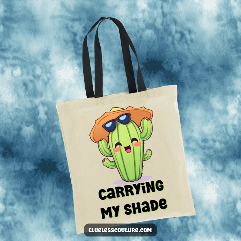 Funny tote bag featuring a beaming cactus character adorned with a ridiculously large and colorful sun hat.