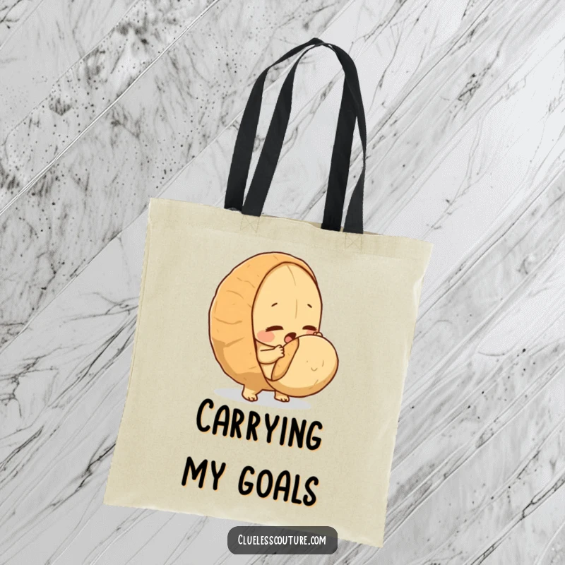 Funny tote bag with a determined peanut heroically trying to crack a very large nut.