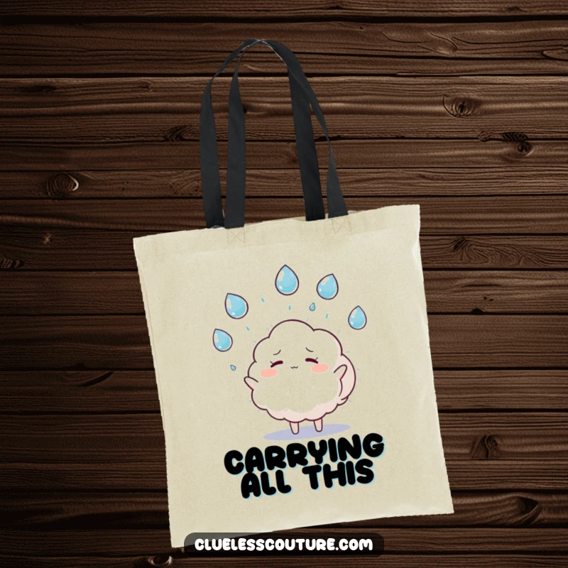 Funny tote bag featuring a fluffy cloud character humorously juggling raindrops while looking overwhelmed, perfect for carrying daily essentials.
