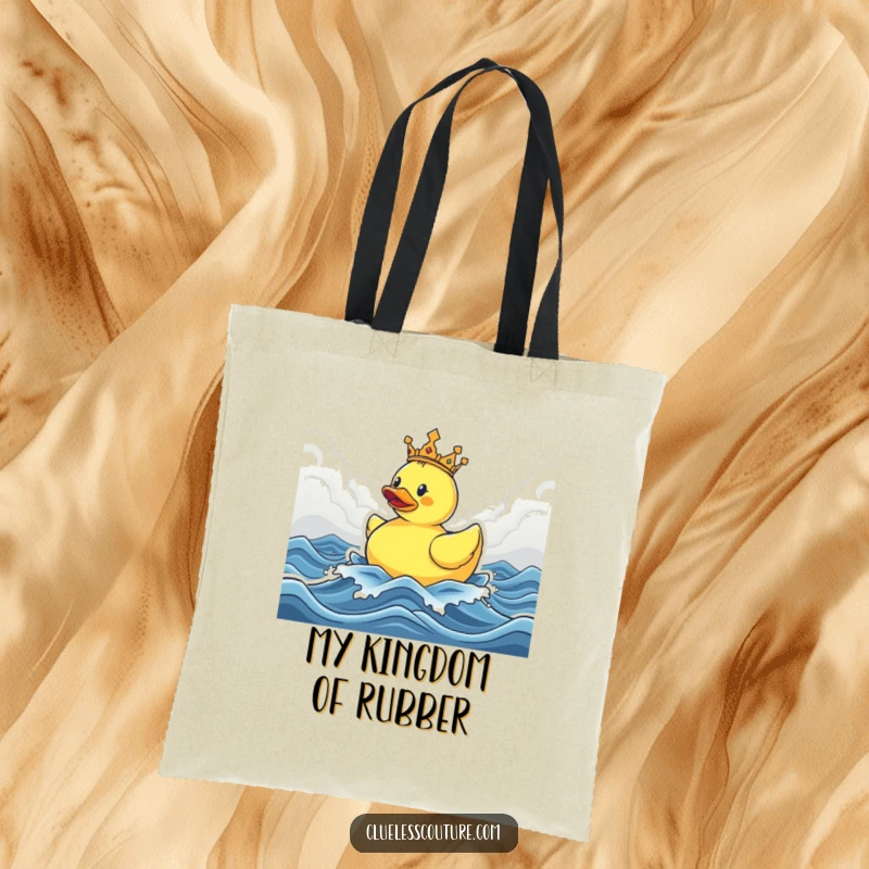 Funny tote bag depicting a crowned rubber ducky sailing triumphantly through rough, stormy seas, a humorous and practical carry-all.