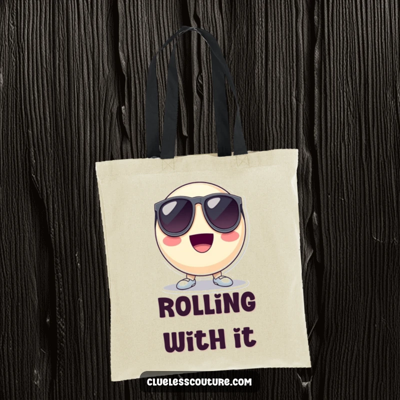 Funny tote bag featuring a bouncing ball character wearing oversized sunglasses and looking cool, perfect for carrying daily items with flair.